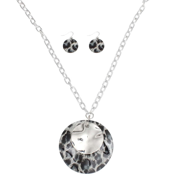 Long leopard pendant silver chain necklace set with matching fish hook earrings, featuring acrylic and metal discs.