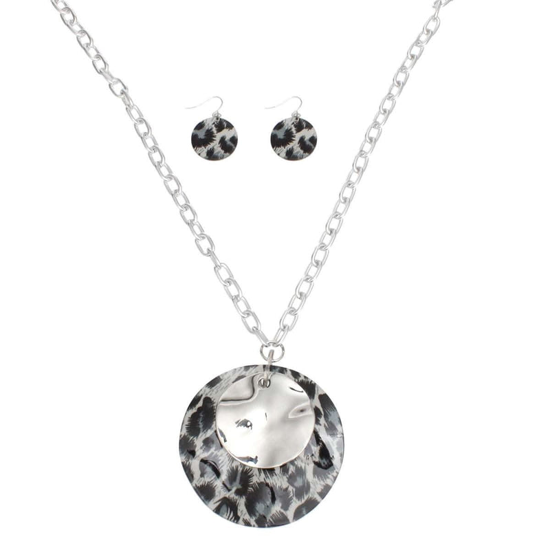 Long leopard pendant silver chain necklace set with matching fish hook earrings, featuring acrylic and metal discs.