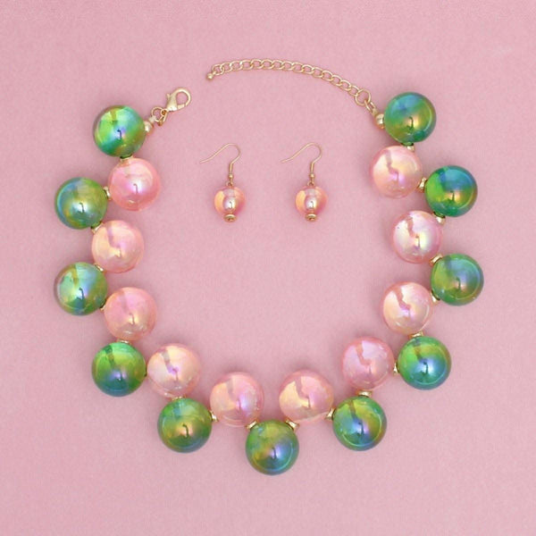 Women's pink and green iridescent bubble ball bead necklace set with matching earrings, featuring gold spacers.