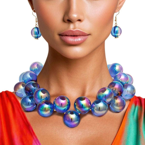 Women's blue iridescent bubble ball bead necklace set with gold metal spacers and matching earrings.